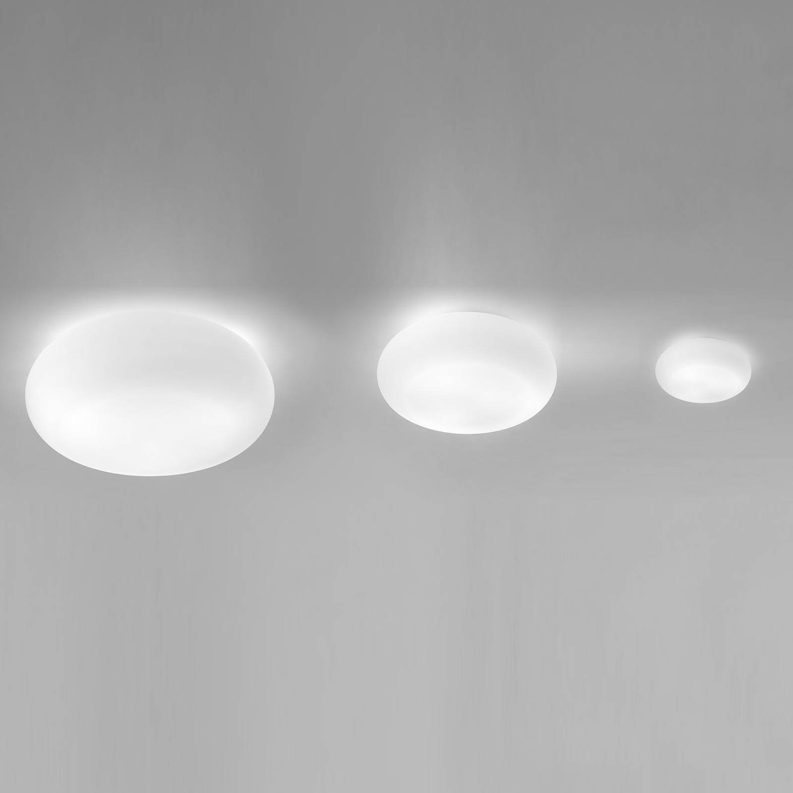 Applique murale Artemide Itka en verre soufflé, forme lenticulaire et format rond