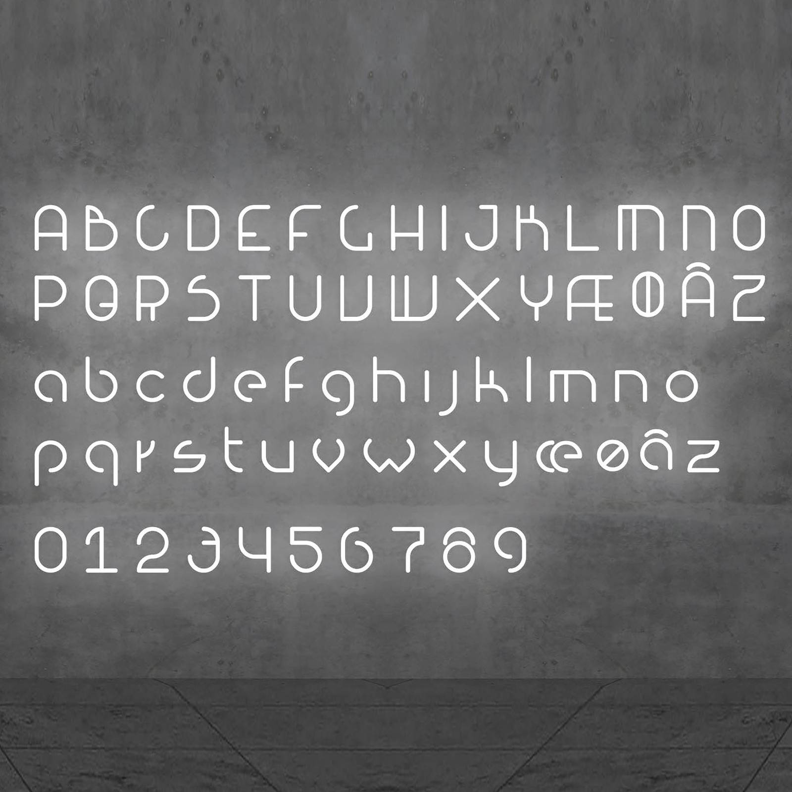 Applique Artemide Alphabet of Light w formant une lettre lumineuse au mur — vue 2
