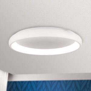 Plafonnier LED Venur circulaire avec lumière réfléchie sur une plaque blanche